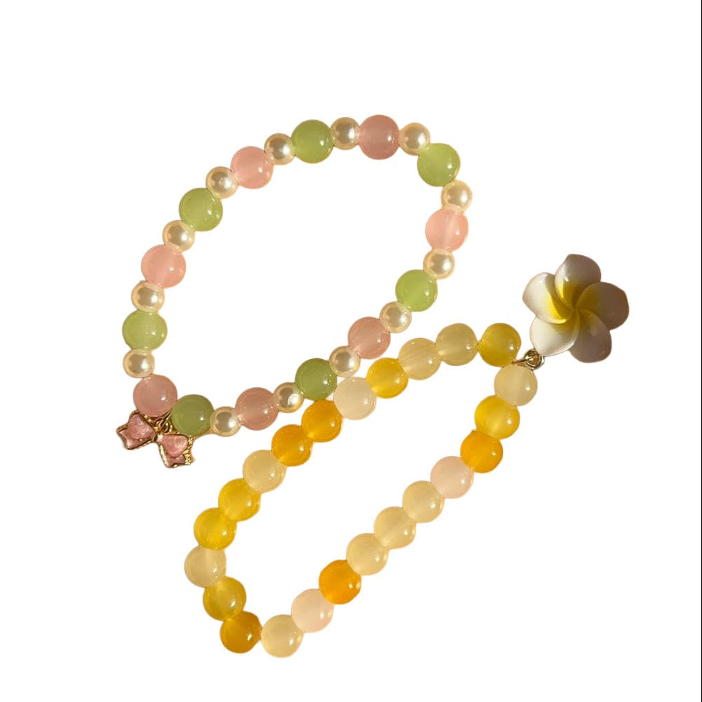 Strawberry Matcha and Lemon Lime bracelet duo on white background